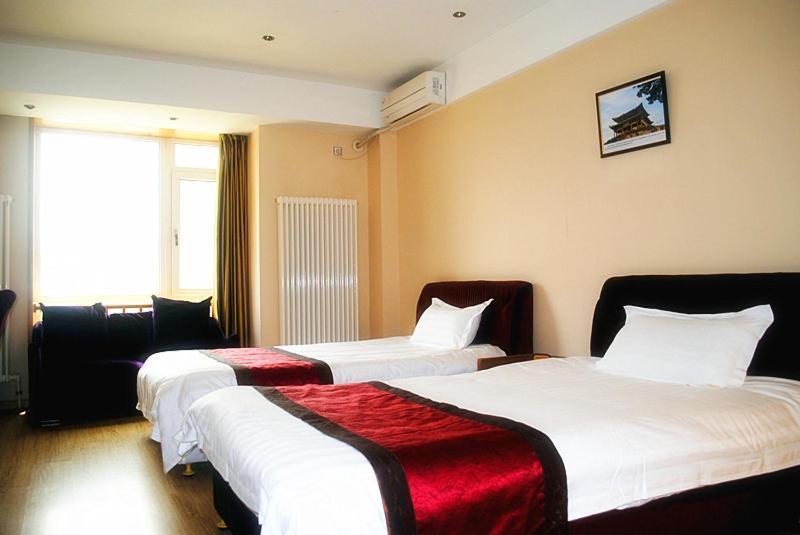Dalian Sanjin Business Hotel Bagian luar foto