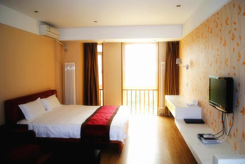 Dalian Sanjin Business Hotel Bagian luar foto