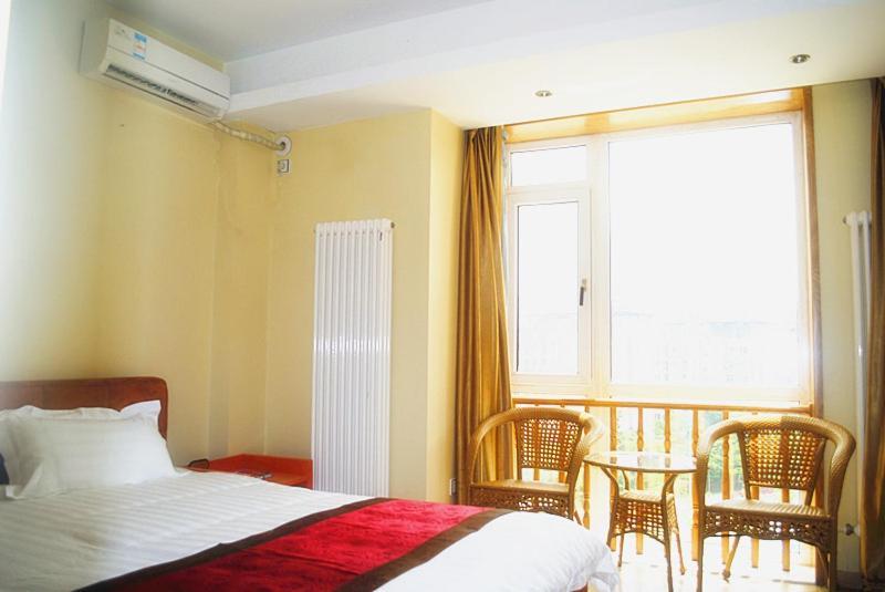 Dalian Sanjin Business Hotel Bagian luar foto