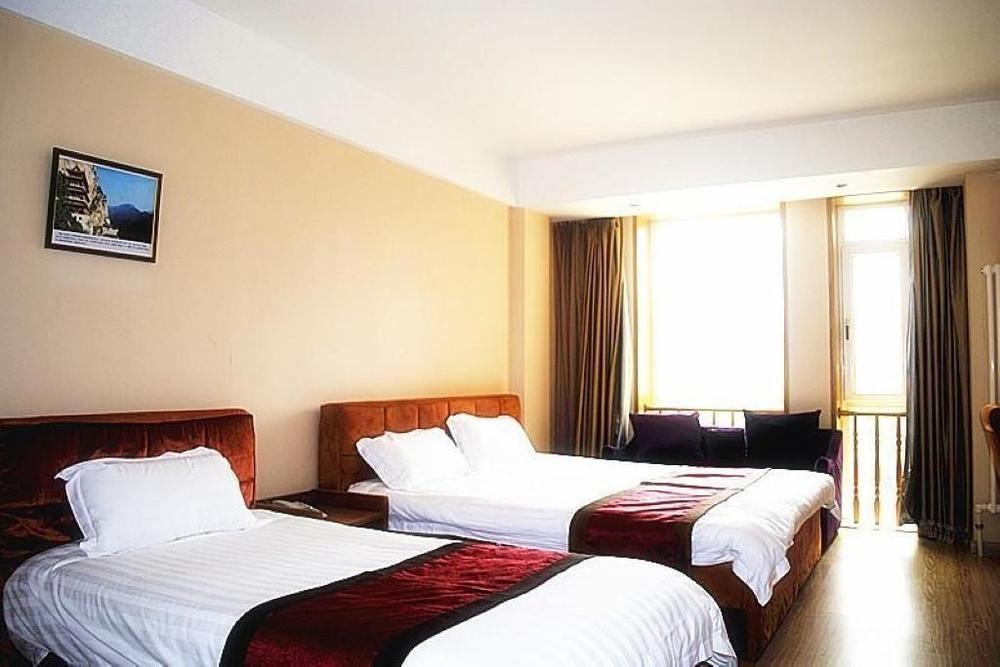 Dalian Sanjin Business Hotel Bagian luar foto
